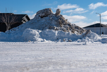 Fototapeta na wymiar snow pile on the street 