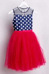 Dress for a girl - festive outfit on a hanger, ball gown for children