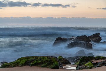 Soft sunrise seascape with clouds