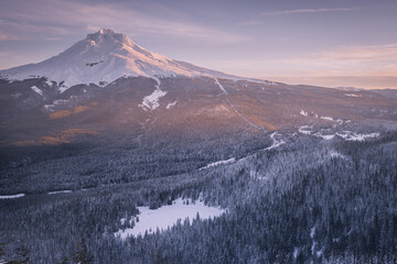 Majestic View of Mount Hood as seen during a winter sunset taken from  the Mount Hood National Forest in Oregon during winter
