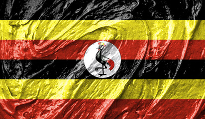Uganda flag on watercolor texture. 3D image