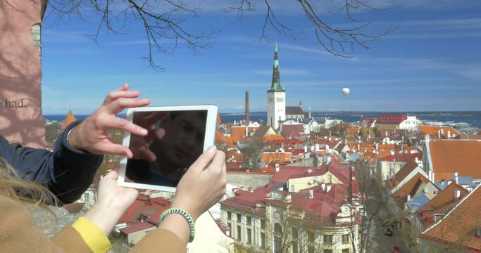 People Taking Top View Photos of Historic City of Tallinn