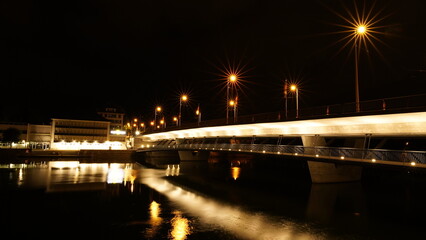 Bridge with lanterns at night