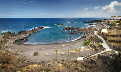 Black sand beach in Los Cancajos, on the eastern shore of La Palma, Canary Islands, Spain