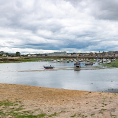 Barfleur in Normandy, the harbor, with traditional houses in background
