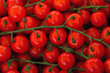 Close up fresh red cherry tomatoes in retail