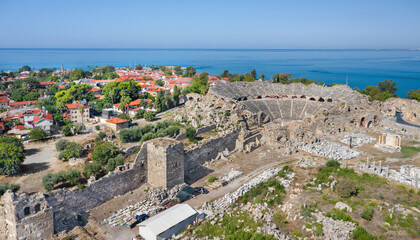 Fototapeta na wymiar The ancient city of Side. Peninsula. Amphitheater in Side. Tyukhe Temple. Agora. Ruins of the ancient city. Turkey. Shooting from a drone