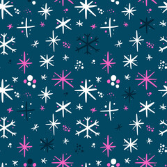 Fototapeta na wymiar Seamless pattern with colorful snowflake doodles on blue background. Modern design for fabric and paper, surface textures.