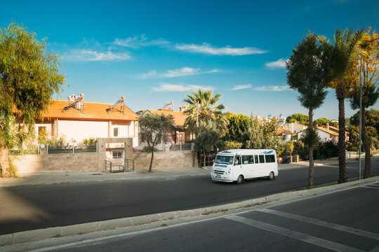 Kusadasi, Ayd n Province, Turkey - September 9, 2019: Urban taxi Minibus driving on street.