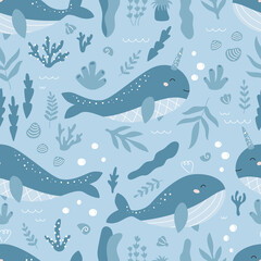 Seamless pattern with cute narwhal, whales and ocean plants. Hand drawn sea animals, seaweeds and corals on blue background. Ideal for textile, wrapping page, package design, wallpaper and banners.