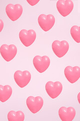 Pink heart levitating with pink background