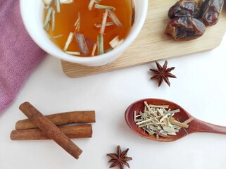 tea with herbs and dates with the addition of cinnamon and star anise