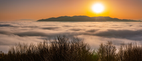 Naklejka premium Misty autumn mountains landscape in the morning, Poland, Beskidy mountains, Prehyba peak seen from Koziarz.