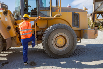 Experienced foreman with hard hat in factory