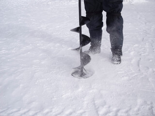 Ice fishing on a lake in Orangeville