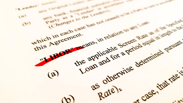 the word LIBOR, short for London Interbank Offered Rate, crossed with a red pen in an agreement ahead of its discontinuation and replacemenr by SOFR and SONIA as risk-free rate