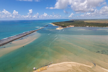 Aerial view of Gunga Beach or "Praia do Gunga", with its clear waters and coconut trees, Maceio, Alagoas. Northeast region of Brazil.