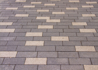 Block stone paving pattern on sidewalk or pavement