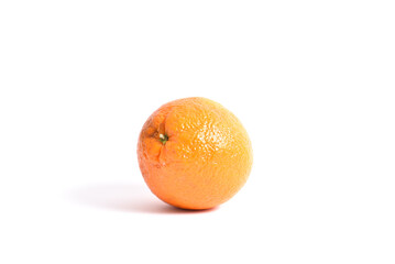 Ripe orange on a white background frontal shot