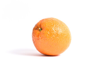 Ripe orange on a white background frontal shot