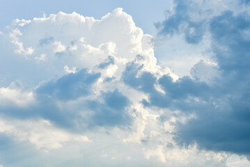 pale white blue sky with scattered cumulus clouds, summer blue sky soft clear