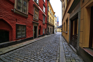 Fototapeta na wymiar Stockholm Gamla Stan old town main street district. Stockholm, Sweden