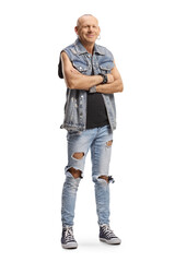 Fototapeta premium Bald man in a denim vest posing with crossed arms