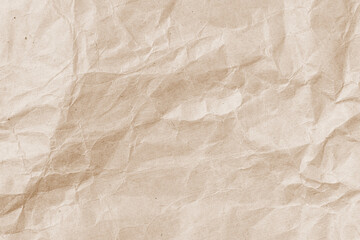 Rumpled environmental or craft paper texture background close-up.