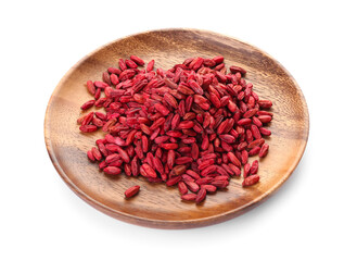 Plate with dried barberries on white background