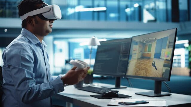 Industrial Software Developer Writing Code and Testing 3D Interior Design Interface. Engineer Editing and Moving Furniture while Wearing Virtual Reality Headset and Using Controllers.