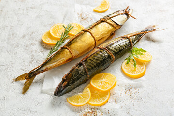 Smoked mackerel fishes on light background