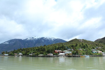 Fototapeta na wymiar Puerto Tortel, south Chile, houses over water.