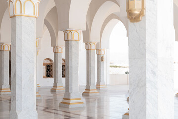 Portico of El Salam Mosque with white columns and arches. Sharm el Sheikh, Egypt.