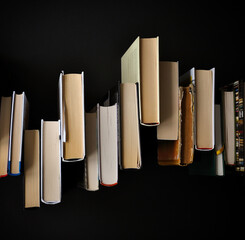Book compositions on a dark background. Minimal design for the cover