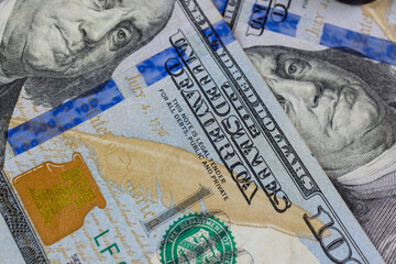 One hundred dollar bills of US money banknotes