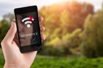 Human searching for the mobile coverage on the mobile phone, no service screen