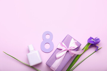 Composition with figure 8, gift box, perfume bottle and iris flower for International Women's Day celebration on color background