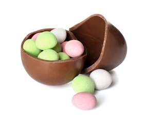 Chocolate Easter egg with candies isolated on white background