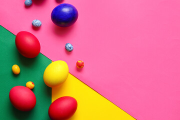 Multicolored Easter eggs on color background