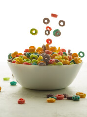 original composition. Fruit multi-colored crunchy cereal rings. Levitation. Fast food breakfasts, healthy food, kids food, school food, sweet food. Vitamins. Advertising, banner.