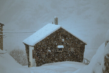snowy mountain house, in winter