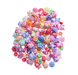 Pile of cute colorful ceramic beads on white background, top view