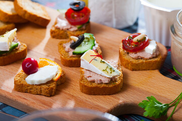 Set of various mini appetizers with vegetable, cheese and meat pate filling