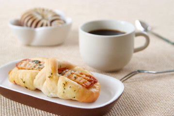 Sausage,Taro bread and cup of coffee