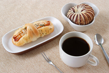Sausage,Taro bread and cup of coffee