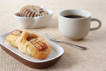 Sausage,Taro bread and cup of coffee