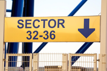 sign pointer sector aisle at the stadium. entrance to the grandstand of a sports event