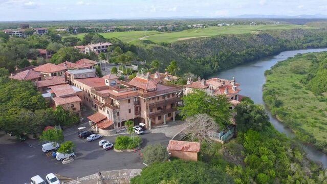Altos de chavon in aerial shot, overlooking the golf courses and river chavon, sunny day