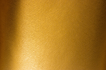 Gold background with a fine bumpy texture.