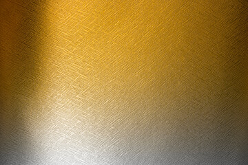 Gold and Silver background with a fine bumpy texture.
